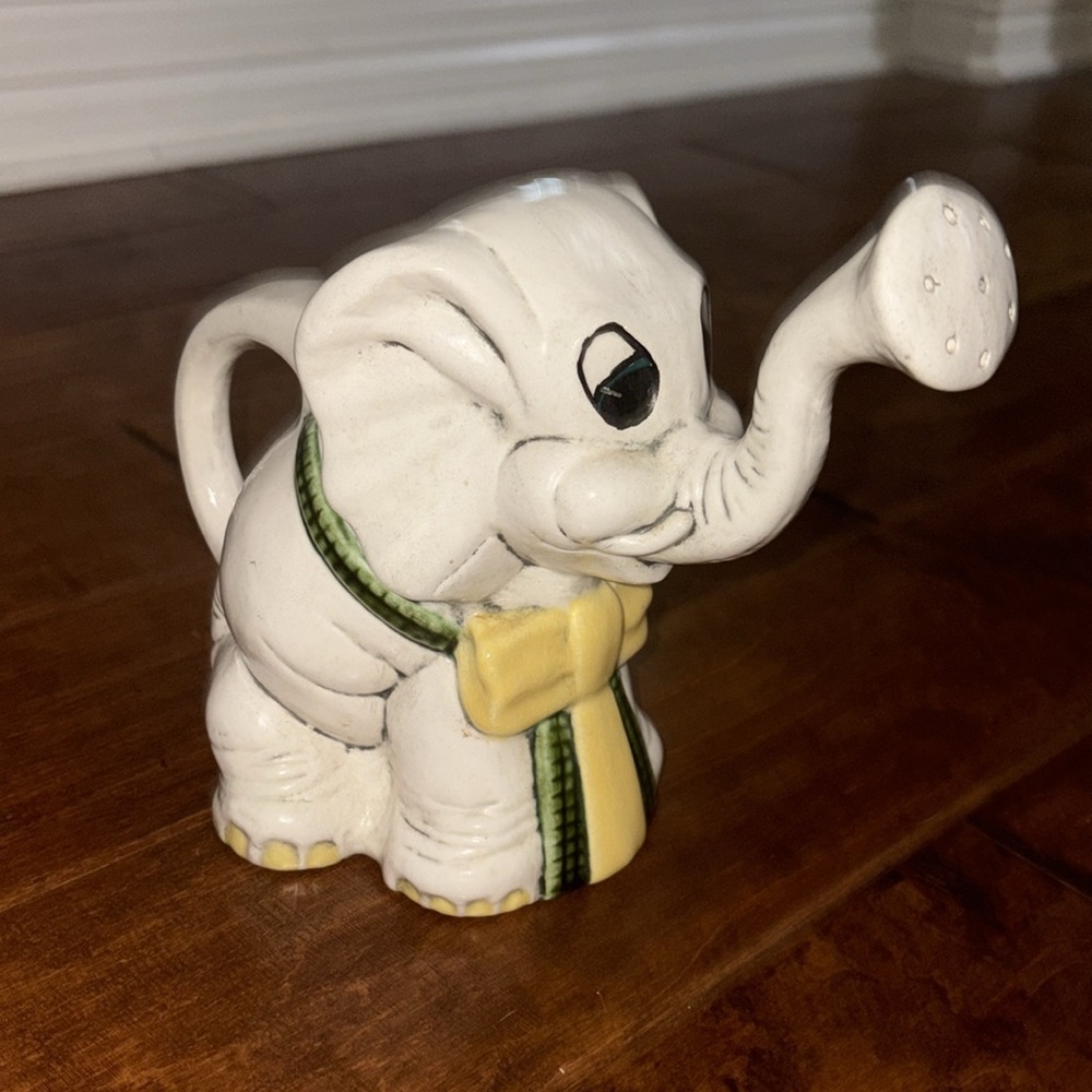 Ceramic Elephant watering can Figurine with Yellow and Green Accents